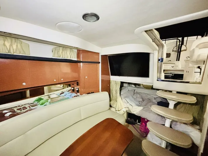 Yacht Photos Pics Interior of 2005 Sea Ray 340 Sundancer yacht with seating, stairs, and storage.