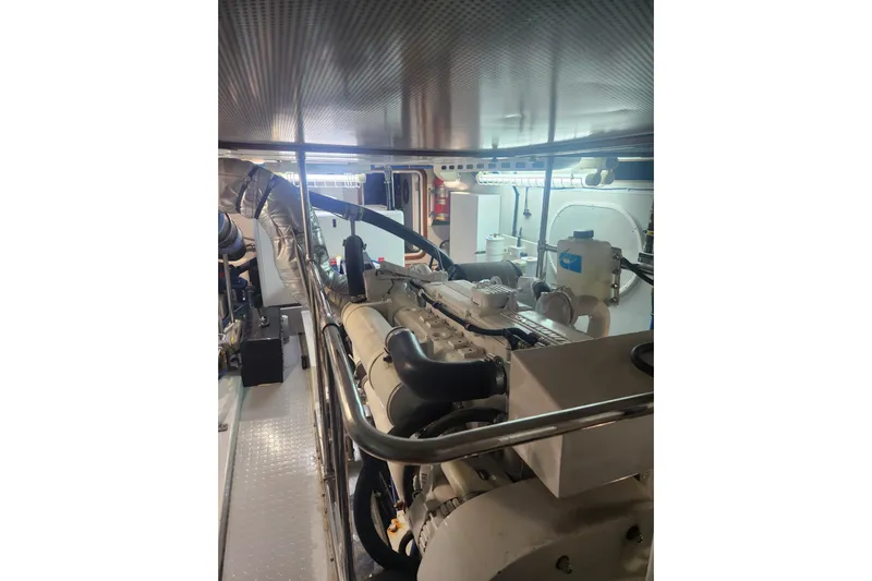 Felix Yacht Photos Pics Engine room of 2008 Selene 53 Ocean Classic yacht, featuring mechanical components and piping.