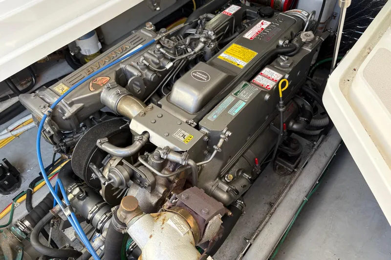Intermission Yacht Photos Pics Engine compartment of a 2006 Back Cove 29 boat, featuring a Yanmar engine.