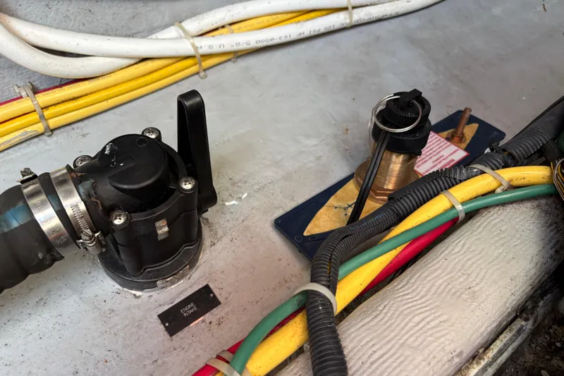 Intermission Yacht Photos Pics Engine compartment of 2006 Back Cove 29 with wiring and intake components.