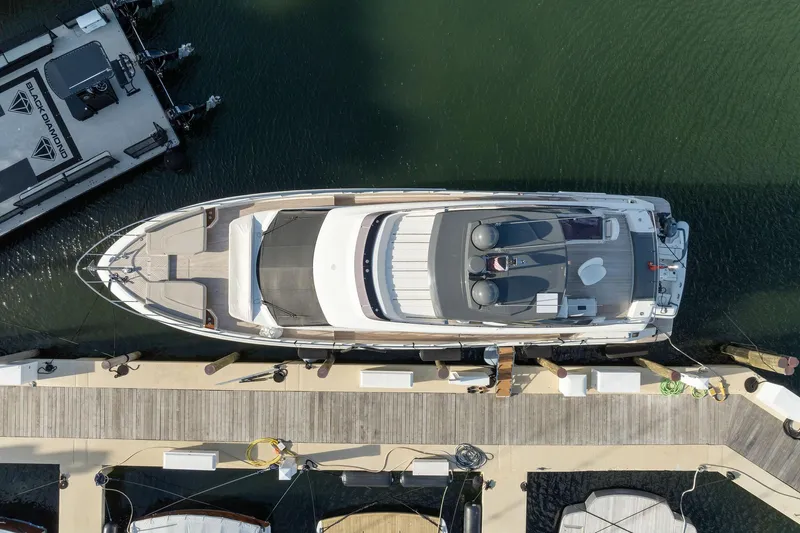 Only One Yacht Photos Pics Top view of a 2020 Ferretti Yachts 670 docked at a marina.