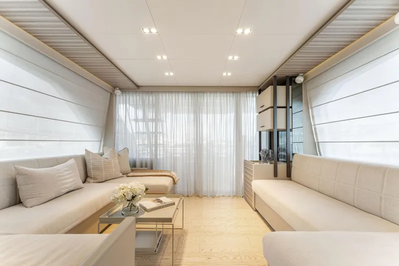 Only One Yacht Photos Pics Luxurious interior of 2020 Ferretti Yachts 670 with elegant seating and modern decor.