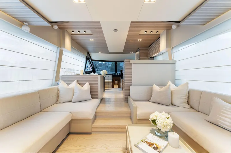 Only One Yacht Photos Pics Luxurious interior of 2020 Ferretti Yachts 670 with elegant seating and modern decor.