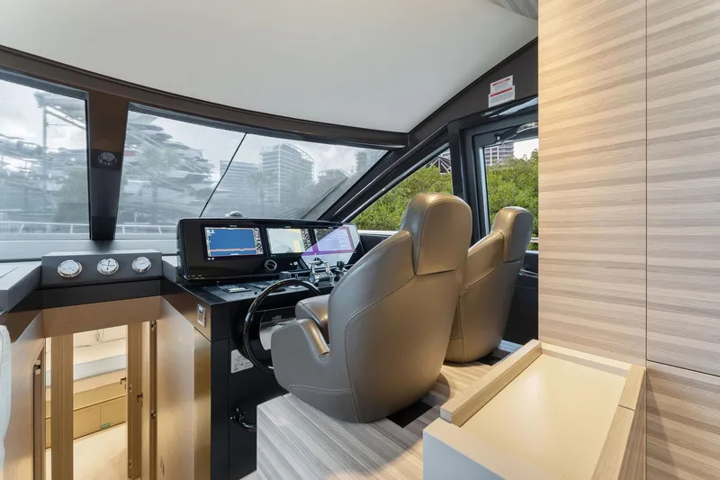 Only One Yacht Photos Pics Interior helm of 2020 Ferretti Yachts 670 with modern navigation equipment.