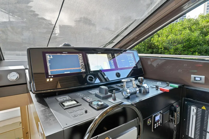 Only One Yacht Photos Pics Cockpit of 2020 Ferretti Yachts 670 with advanced navigation controls and displays.