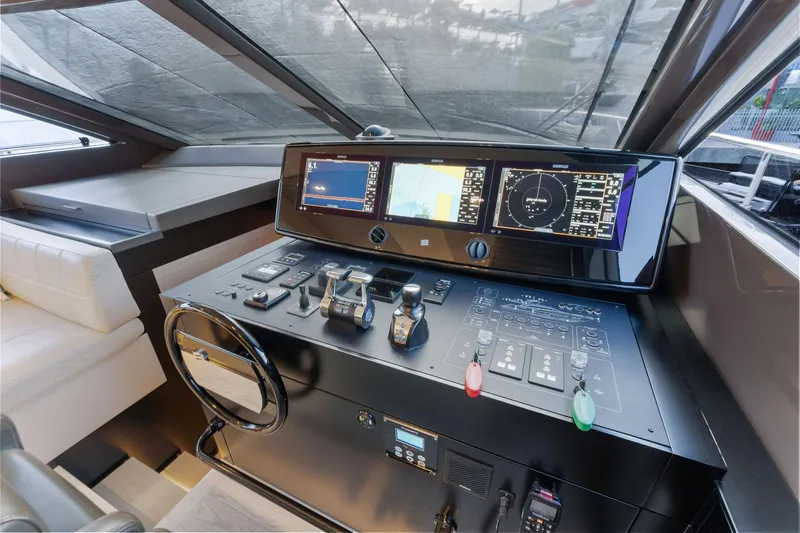 Only One Yacht Photos Pics Cockpit of 2020 Ferretti Yachts 670 with advanced navigation controls and displays.