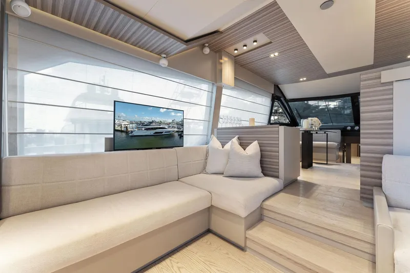 Only One Yacht Photos Pics Luxurious interior of 2020 Ferretti Yachts 670 with modern design and comfortable seating.