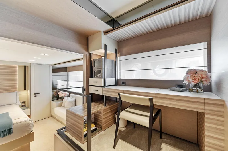Only One Yacht Photos Pics Luxurious interior of 2020 Ferretti Yachts 670, featuring elegant wood finishes and modern decor.
