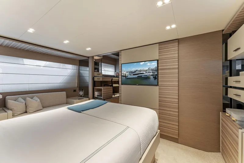 Only One Yacht Photos Pics Luxurious bedroom interior of 2020 Ferretti Yachts 670 with modern design and large TV.