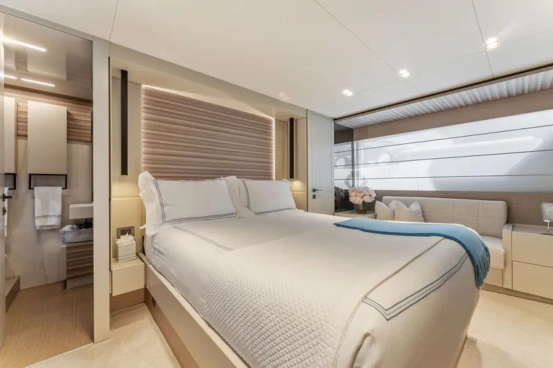 Only One Yacht Photos Pics Luxurious bedroom interior of 2020 Ferretti Yachts 670, featuring elegant design and modern amenities.
