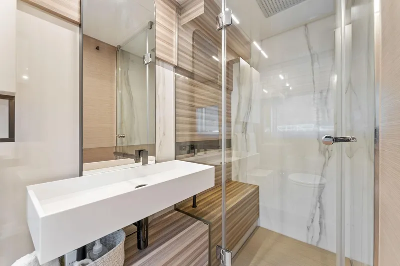 Only One Yacht Photos Pics Luxurious bathroom in 2020 Ferretti Yachts 670, featuring modern design and elegant finishes.