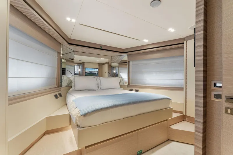 Only One Yacht Photos Pics Luxurious bedroom interior of 2020 Ferretti Yachts 670, featuring modern design and cozy ambiance.
