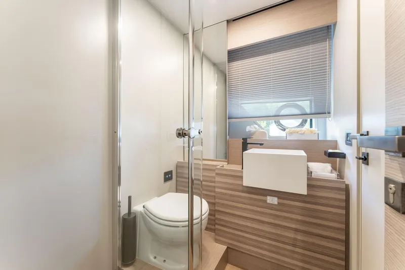 Only One Yacht Photos Pics Modern bathroom interior on 2020 Ferretti Yachts 670, featuring sleek design and natural light.