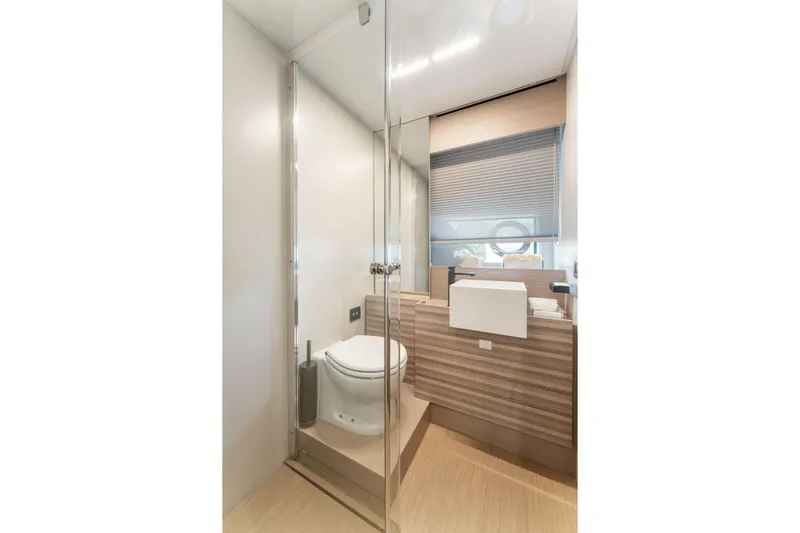Only One Yacht Photos Pics Luxurious bathroom in 2020 Ferretti Yachts 670, featuring modern design and elegant fixtures.
