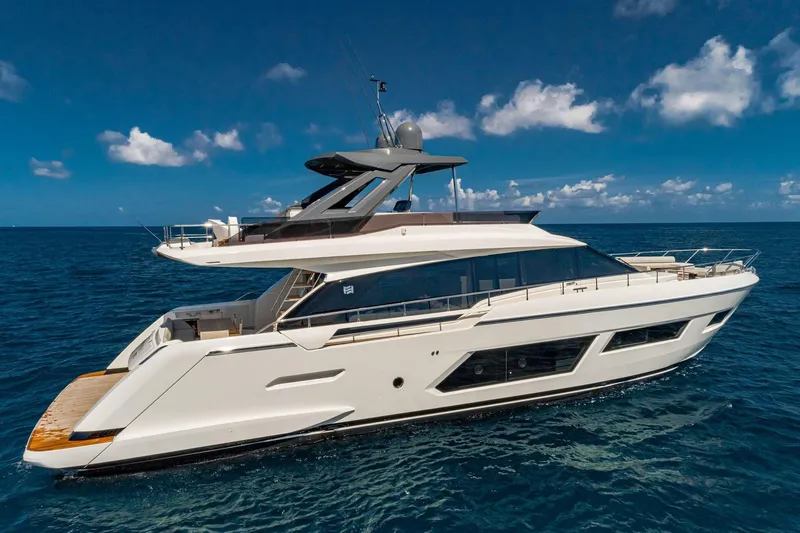 Only One Yacht Photos Pics 2020 Ferretti Yachts 670 cruising on open sea under clear blue sky.