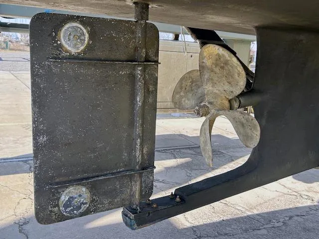 Riverwind Yacht Photos Pics Propeller and rudder of 2008 Eastern Casco Bay 31 boat on dry dock.