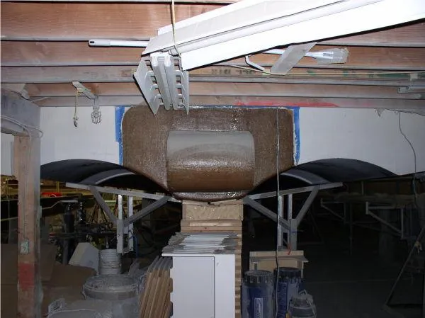  Yacht Photos Pics 2022 Westport HULL ONLY project under construction in a workshop setting.