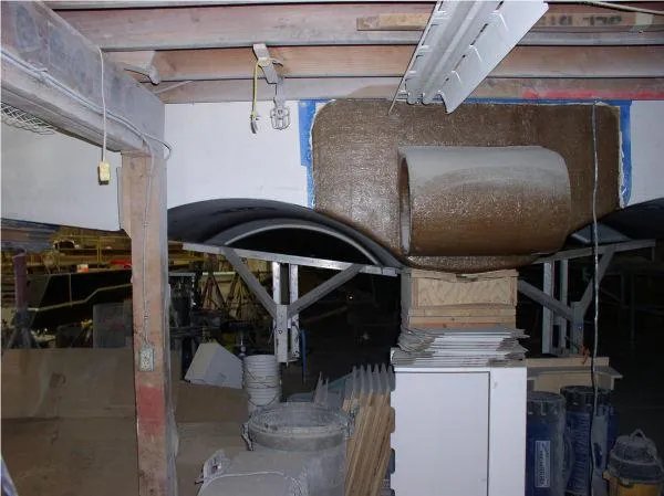  Yacht Photos Pics Workshop with Westport 2022 hull project, featuring fiberglass materials and construction tools.