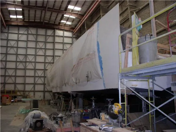  Yacht Photos Pics 2022 Westport HULL ONLY project in a large industrial workshop.