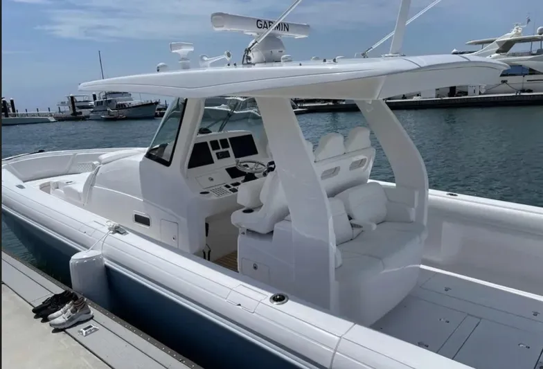  Yacht Photos Pics 2022 Intrepid 407 Nomad SE boat docked at marina.