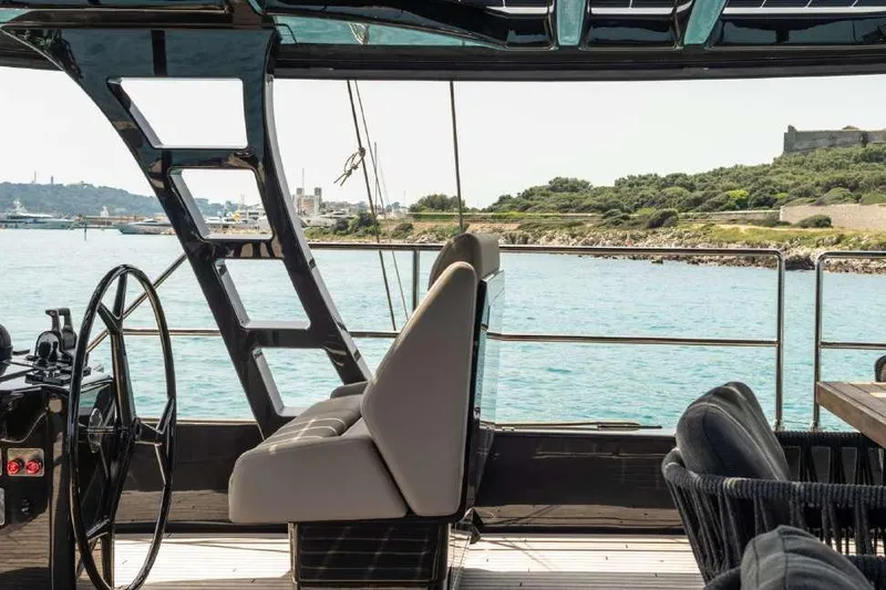 Black Raptor Yacht Photos Pics 2024 Sunreef 60 Eco Sailing yacht interior with scenic ocean view.