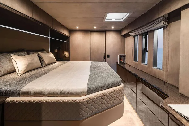 Black Raptor Yacht Photos Pics Luxurious interior of 2024 Sunreef 60 Eco Sailing yacht with elegant bedroom design.