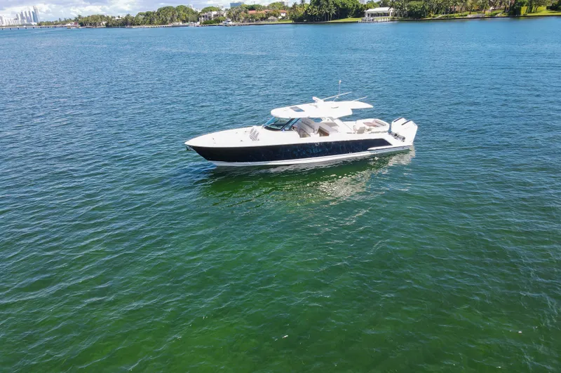 Marilee Yacht Photos Pics 2024 Tiara Yachts 43 LS cruising on clear blue water.