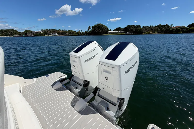 Marilee Yacht Photos Pics 2024 Tiara Yachts 43 LS with twin Mercury outboard engines on a sunny day.