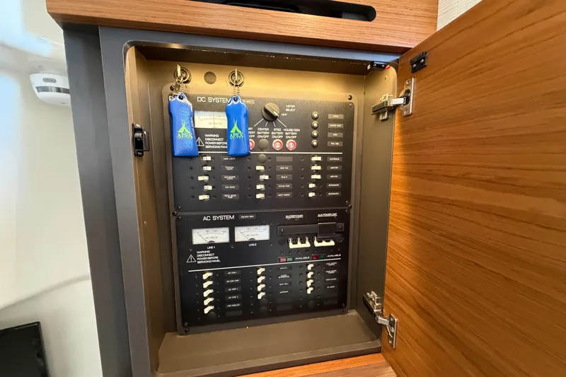 Marilee Yacht Photos Pics Electrical panel inside 2024 Tiara Yachts 43 LS, featuring AC and DC systems.