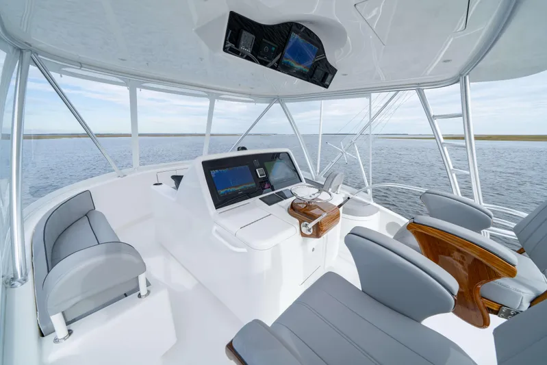 2026 Viking 50c Yacht Photos Pics Luxurious interior of 2026 Viking 50 Convertible yacht with modern navigation equipment.