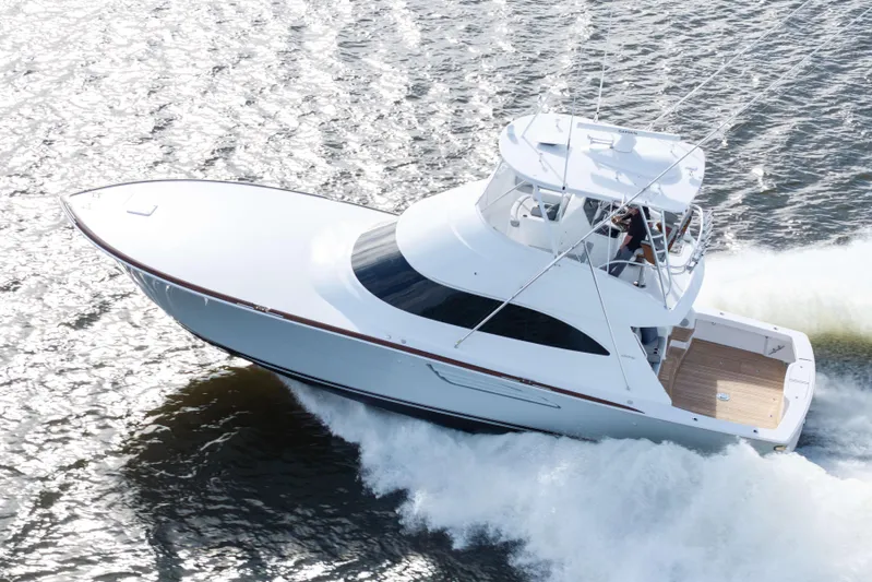 2026 Viking 50c Yacht Photos Pics 2026 Viking 50 Convertible yacht cruising on open water, showcasing sleek design and performance.