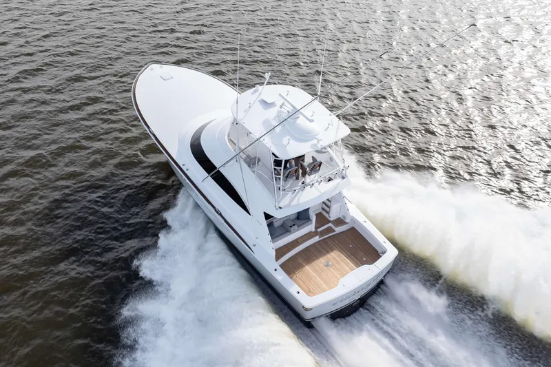 2026 Viking 50c Yacht Photos Pics 2026 Viking 50 Convertible yacht cruising on open water, aerial view.