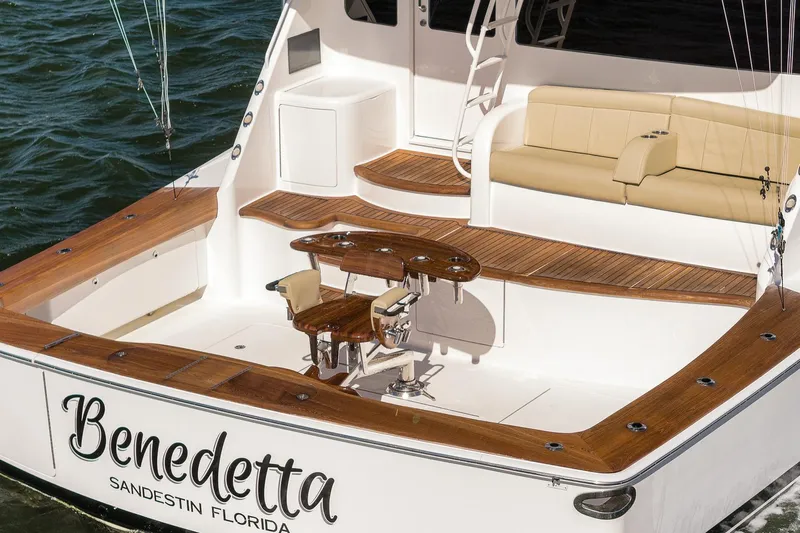 Benedetta Yacht Photos Pics Luxury 2012 Viking 70 Enclosed Bridge yacht with elegant teak deck and seating area.