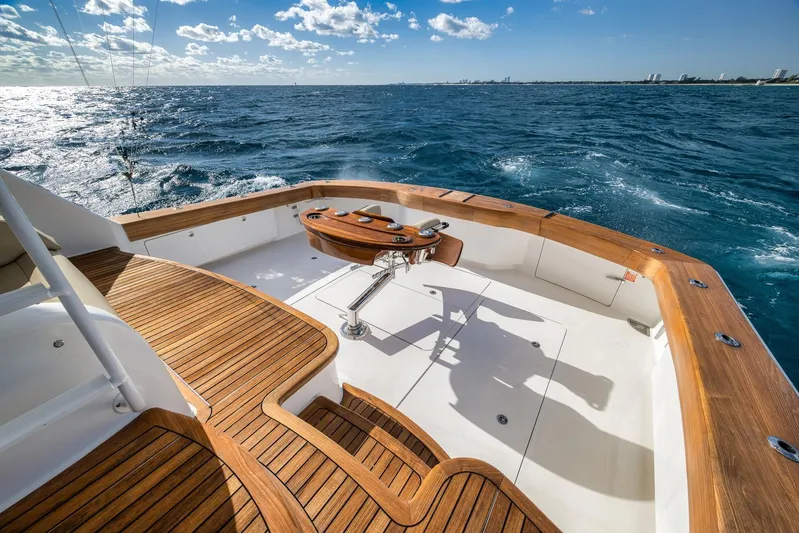 Benedetta Yacht Photos Pics Luxurious 2012 Viking 70 Enclosed Bridge yacht with teak deck on open sea.