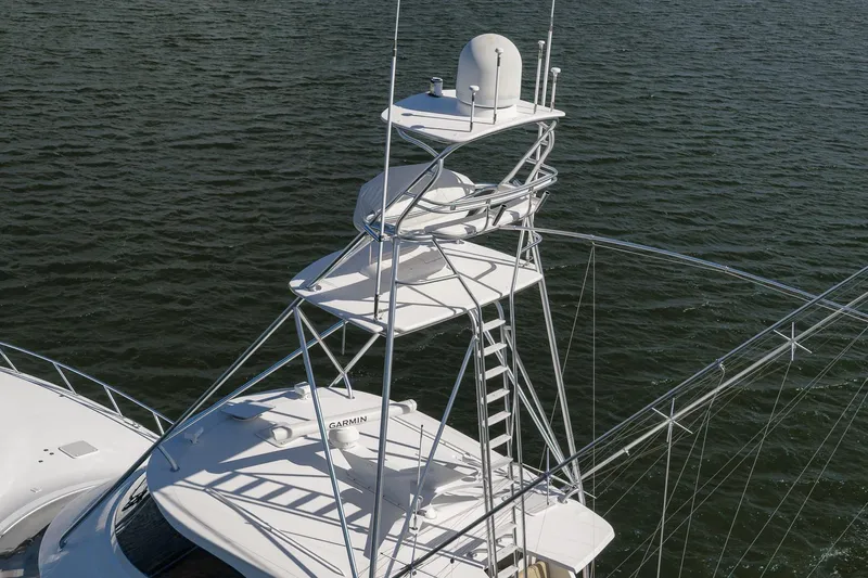 Benedetta Yacht Photos Pics 2012 Viking 70 Enclosed Bridge yacht with tower on open water.