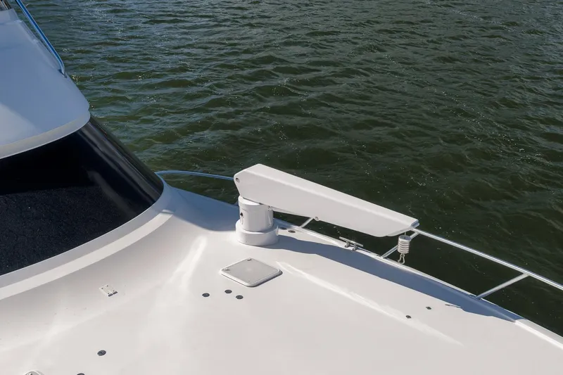 Benedetta Yacht Photos Pics 2012 Viking 70 Enclosed Bridge yacht deck with radar, on water.