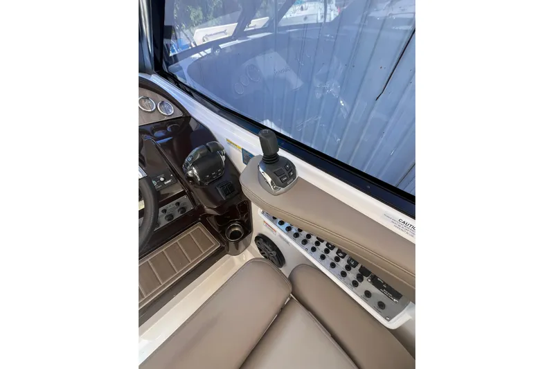  Yacht Photos Pics 2015 Regal 35 Sport Coupe helm with controls and dashboard view.