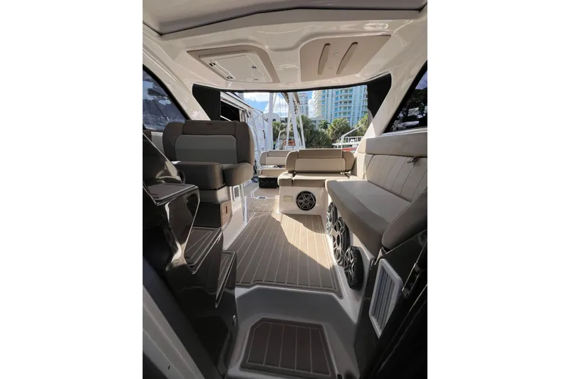  Yacht Photos Pics Interior of 2015 Regal 35 Sport Coupe yacht with modern seating and speakers.