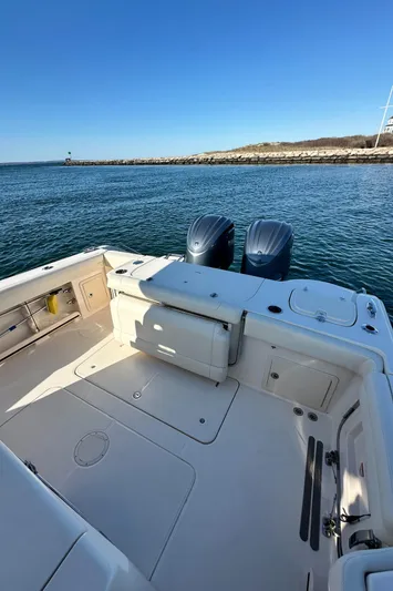  Yacht Photos Pics 2022 Grady-White Canyon 326 boat with dual engines on calm water.