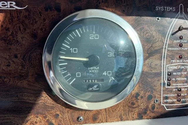 Knot For Sail Yacht Photos Pics Tachometer of 1997 Sea Ray 450 Sundancer boat, showing RPM and system controls.