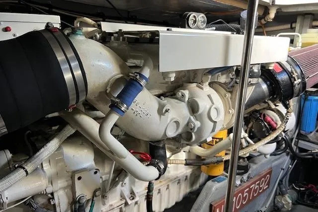 Knot For Sail Yacht Photos Pics Engine of a 1997 Sea Ray 450 Sundancer boat, showcasing intricate mechanical components.