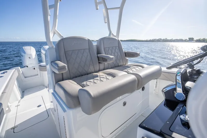  Yacht Photos Pics 2023 Yellowfin 36 boat with luxurious seating, ocean view, and modern design.