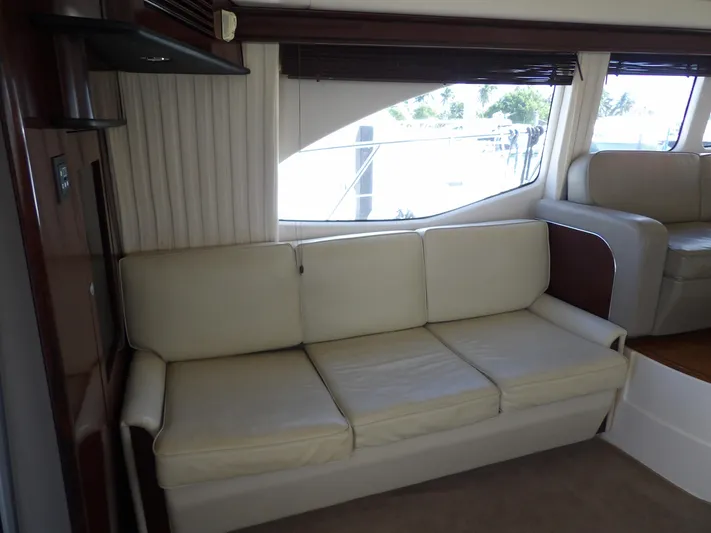  Yacht Photos Pics 2008 Sea Ray 44 Sedan Bridge interior with cream leather sofa.