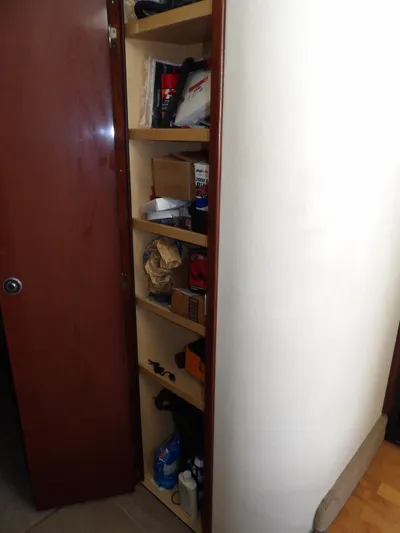  Yacht Photos Pics Storage shelves inside 2008 Sea Ray 44 Sedan Bridge yacht.