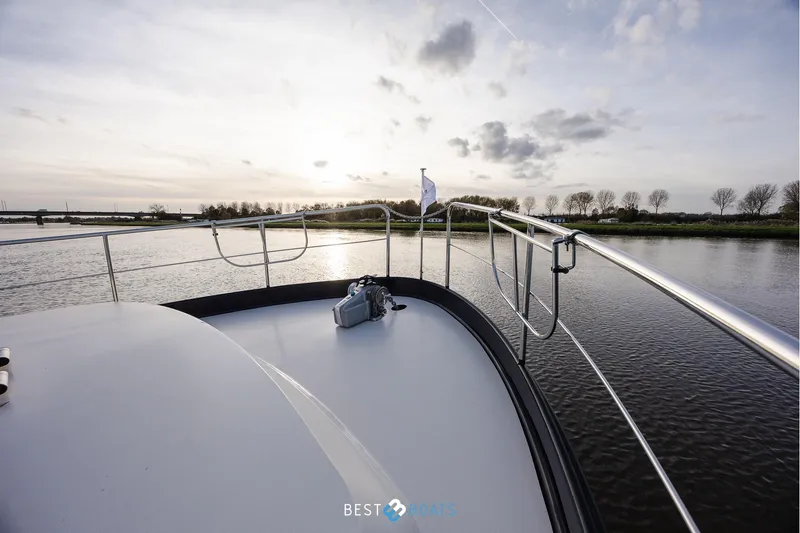  Yacht Photos Pics 2017 Linssen Grand Sturdy 470 Wheelhouse on serene river at sunset.