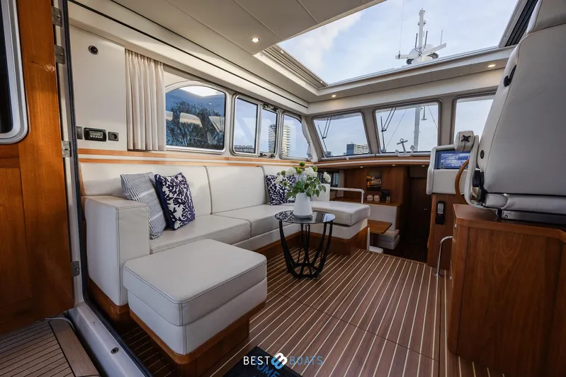  Yacht Photos Pics Luxurious interior of 2017 Linssen Grand Sturdy 470 Wheelhouse yacht with elegant seating and decor.