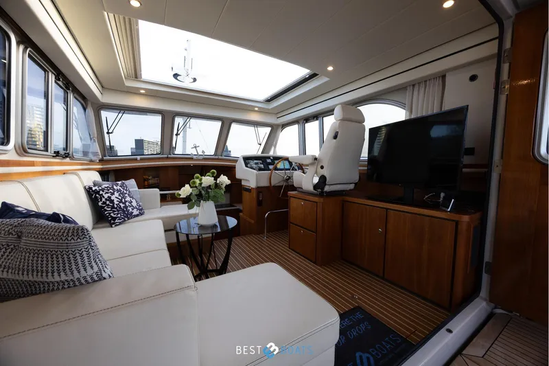  Yacht Photos Pics Luxurious interior of 2017 Linssen Grand Sturdy 470 Wheelhouse with elegant seating and modern amenities.
