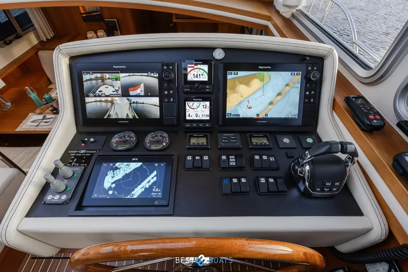  Yacht Photos Pics Control panel of 2017 Linssen Grand Sturdy 470 Wheelhouse with navigation screens and controls.