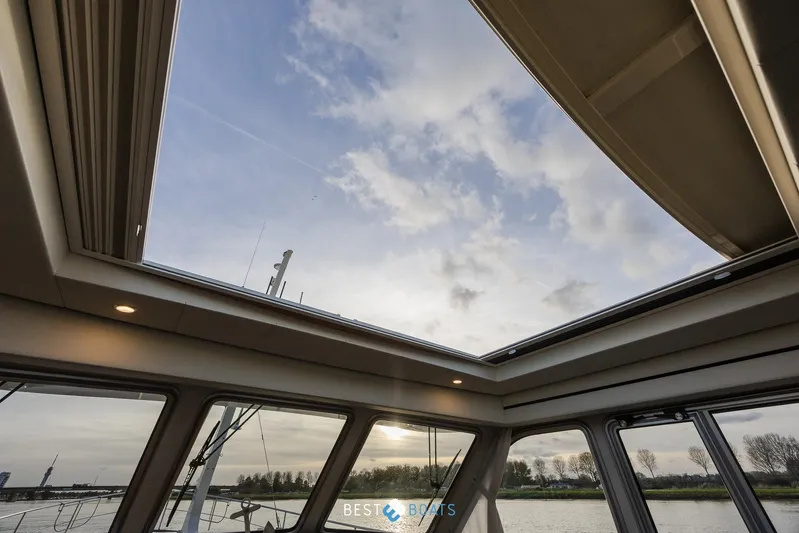  Yacht Photos Pics Interior view of 2017 Linssen Grand Sturdy 470 Wheelhouse with open skylight.