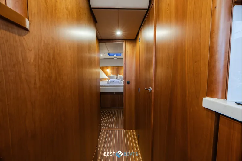  Yacht Photos Pics Luxurious wooden interior of 2017 Linssen Grand Sturdy 470 Wheelhouse yacht cabin.